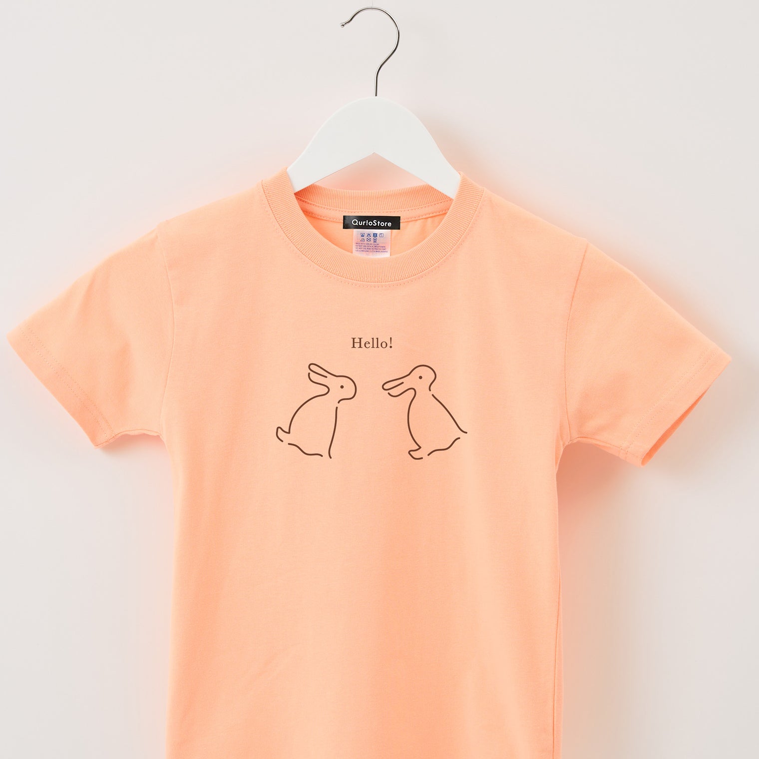"Same?" Tシャツ【キッズ】 アプリコット オレンジ 心理学 多義図形 Tシャツ ウサギ アヒル クイズノック グッズ キッズ 親子 ファミリー 人気 おしゃれ - QurioStore QurioS Kids